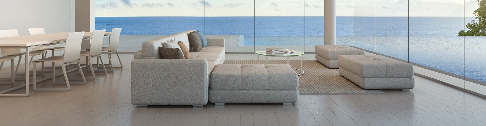 White living room and white dining table and sea views